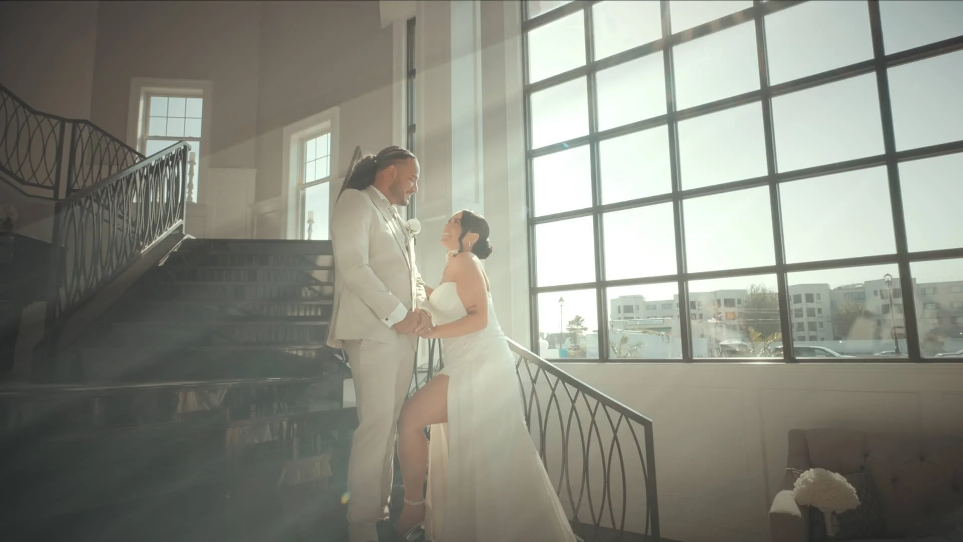 Dana-Marie and Bryan's first look on a grand staircase